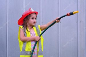 depositphotos_66549653-stock-photo-girl-in-fireman-costume